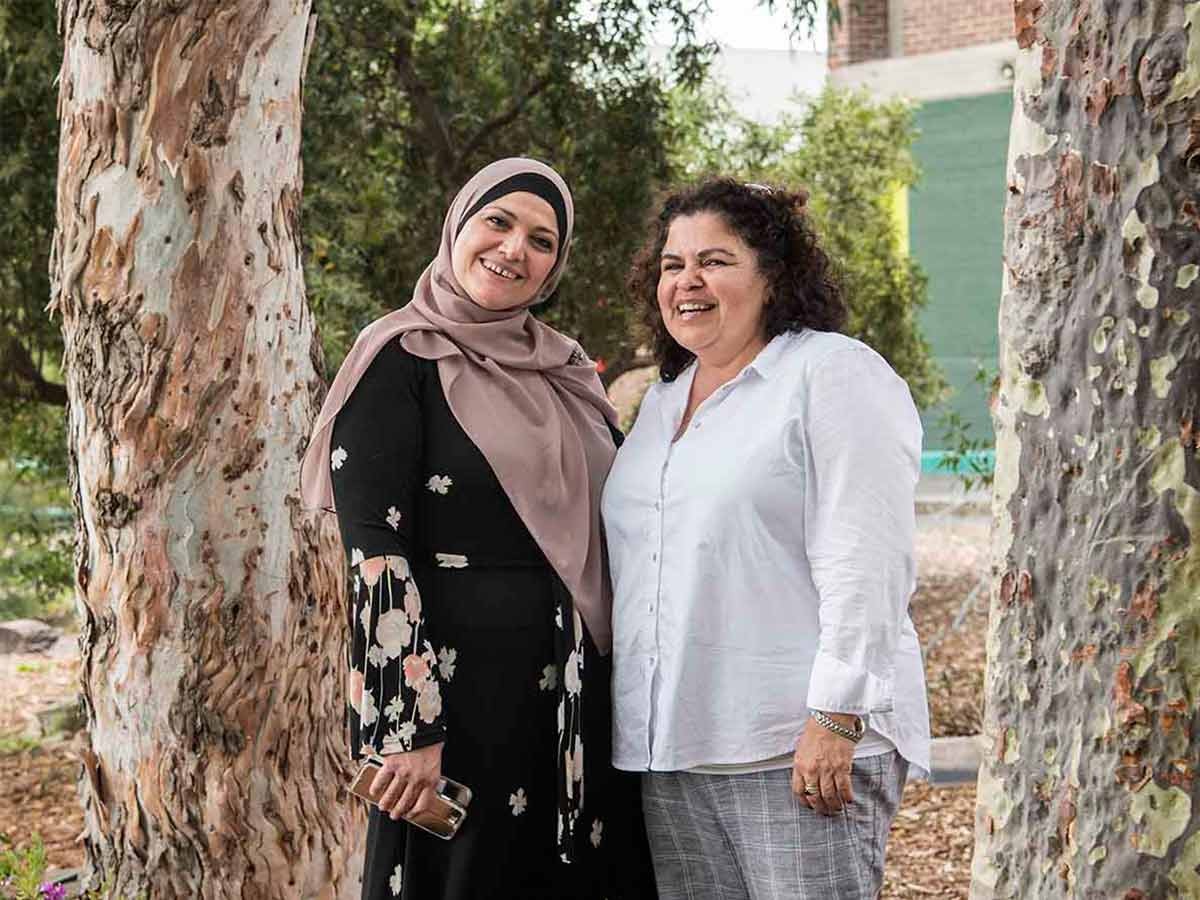 Valuing diversity: Muslim principal Hala Ramadan (left) and Aboriginal principal Fiona Kelly include their students and parents in cultural exchanges. 