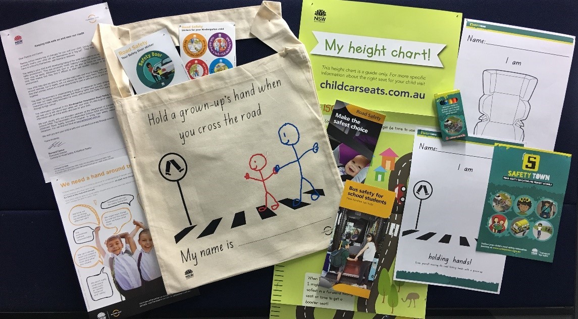 Contents of the Kindergarten Orientation Road Safety Library Bag spread out on a flat surface