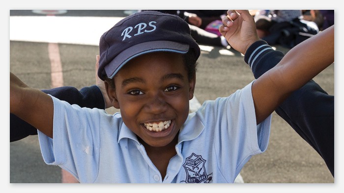 Rosehill student looking excitedly at the camera.