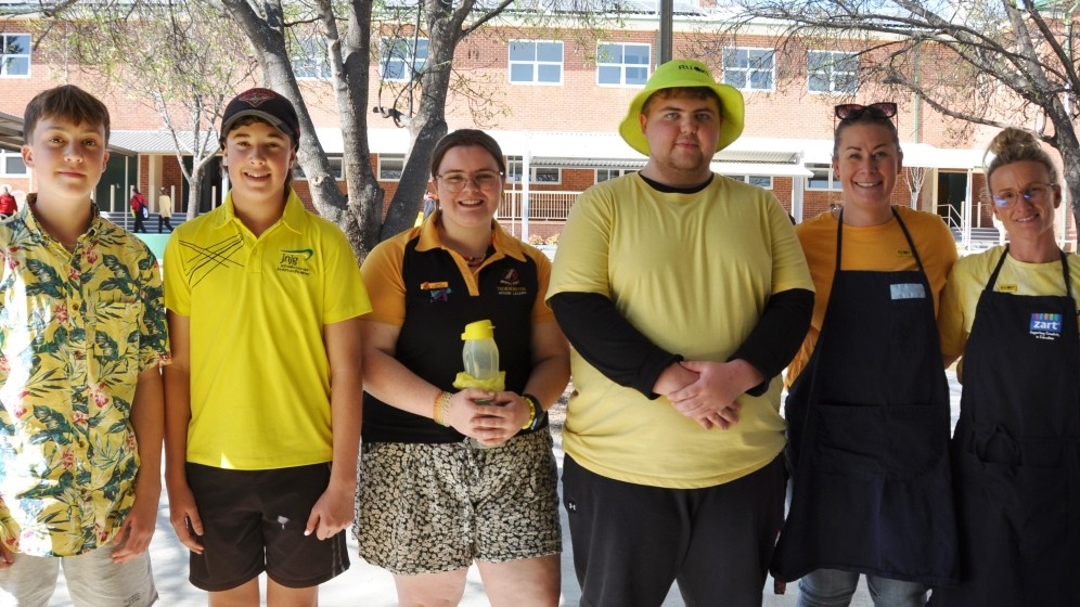 6 high school students dressed in yellow outfits for R U Ok day.