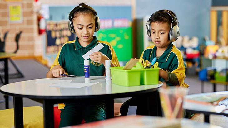 Students working together in the classroom.