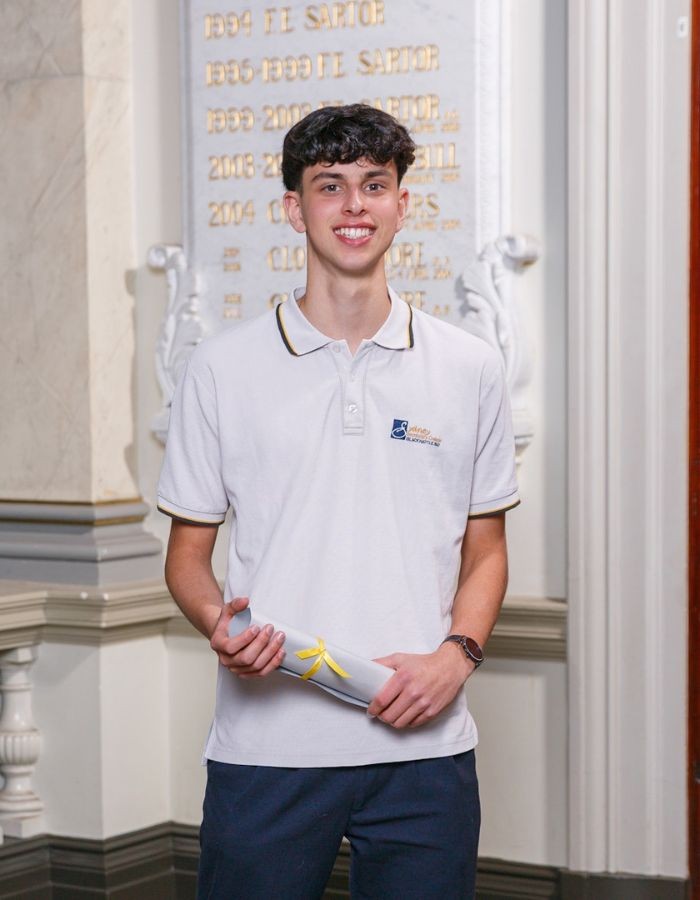 A student holding a brochure.