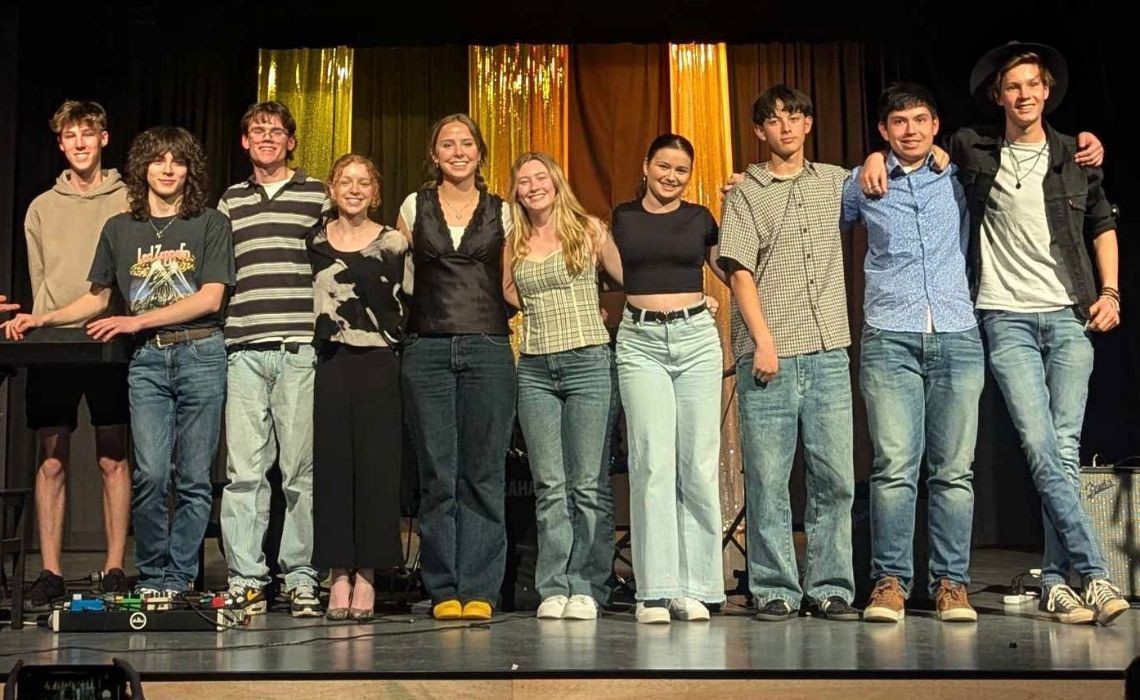 A group of students on a stage.