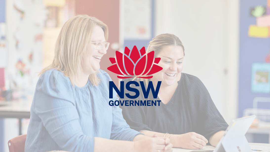 The NSW Government logo overlaying a photo of two women looking at a computer.