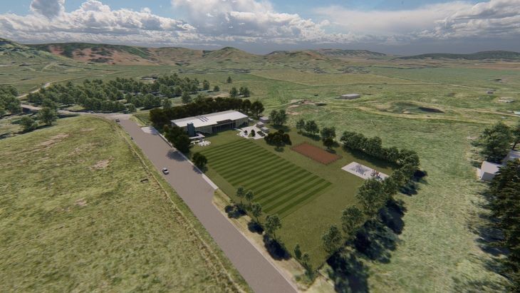 An aerial view of a new school building site.