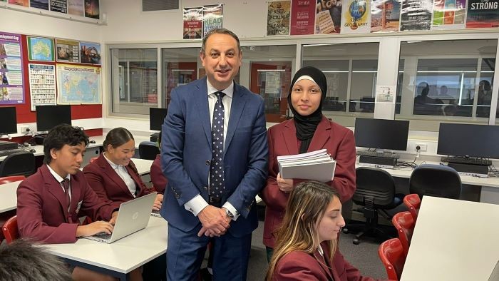 Department Secretary Murat Dizdar with students at Cabramatta High School