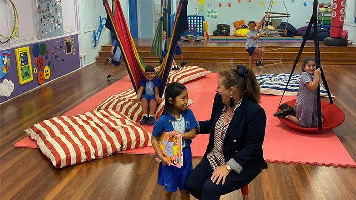A teacher with a number of students in a sensory gym