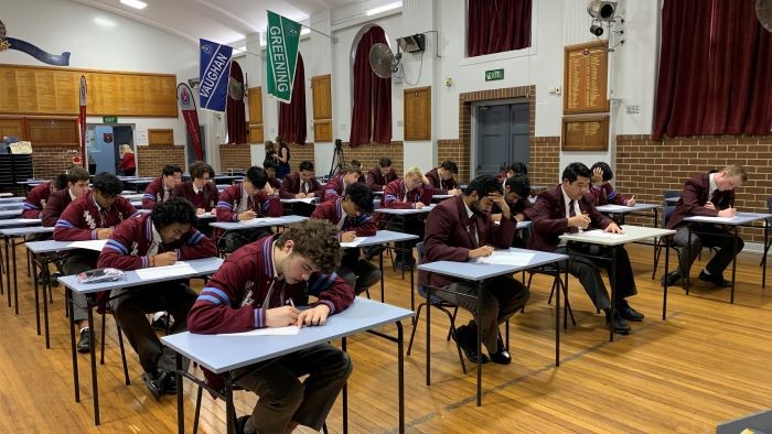 HSC students doing exams in school hall