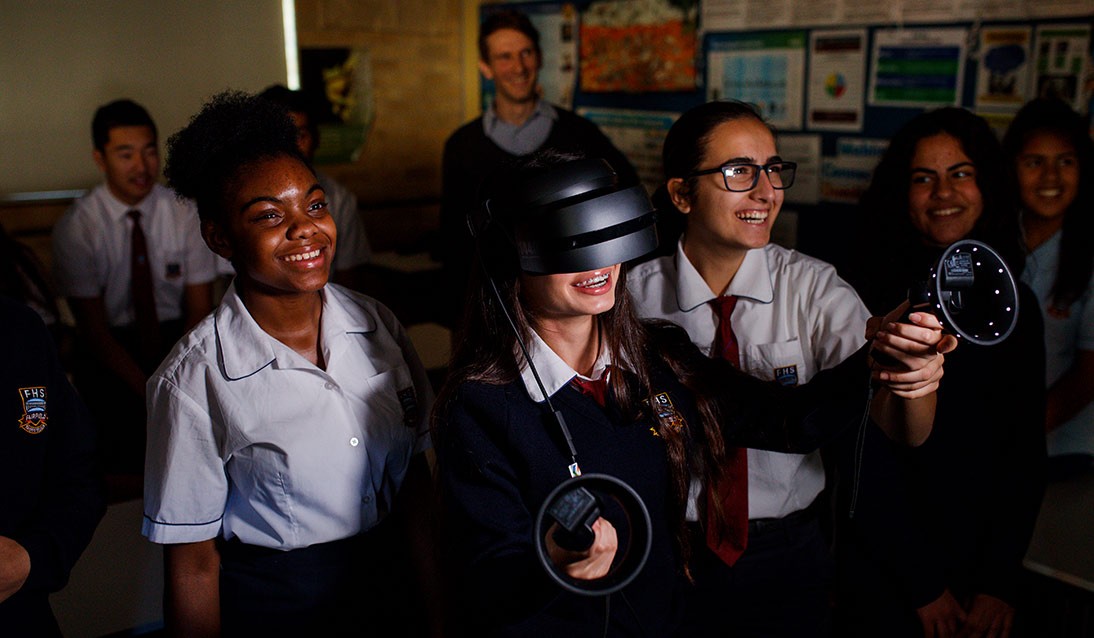 A group of students in class using virtual reality technology