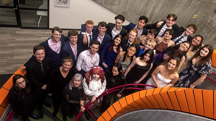 A group of students on the staircase