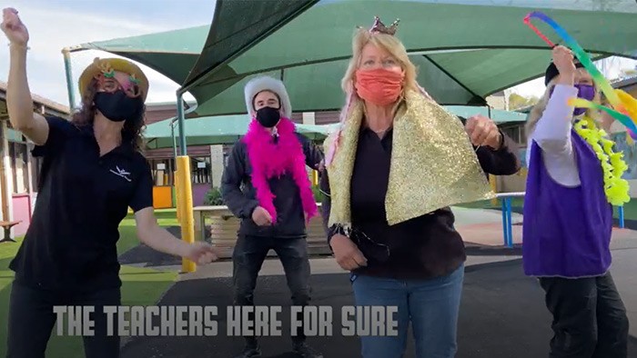 Teachers in fancy dress in the playground