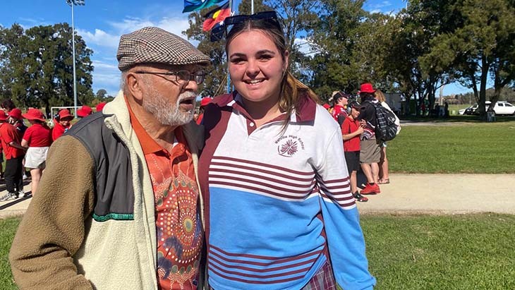 An Aboriginal Elder and and a young Aboriginal woman.