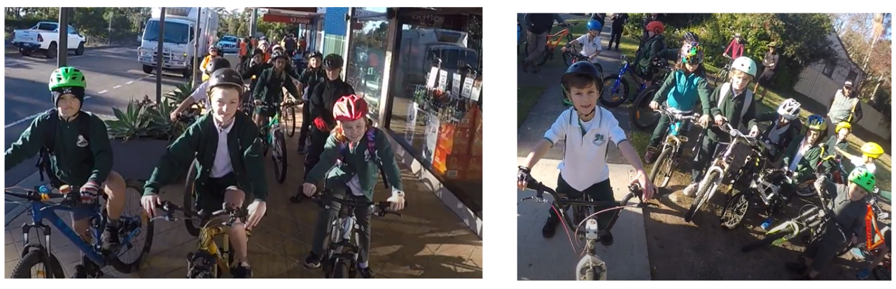 Children riding their bikes wearing helmets and being supervised