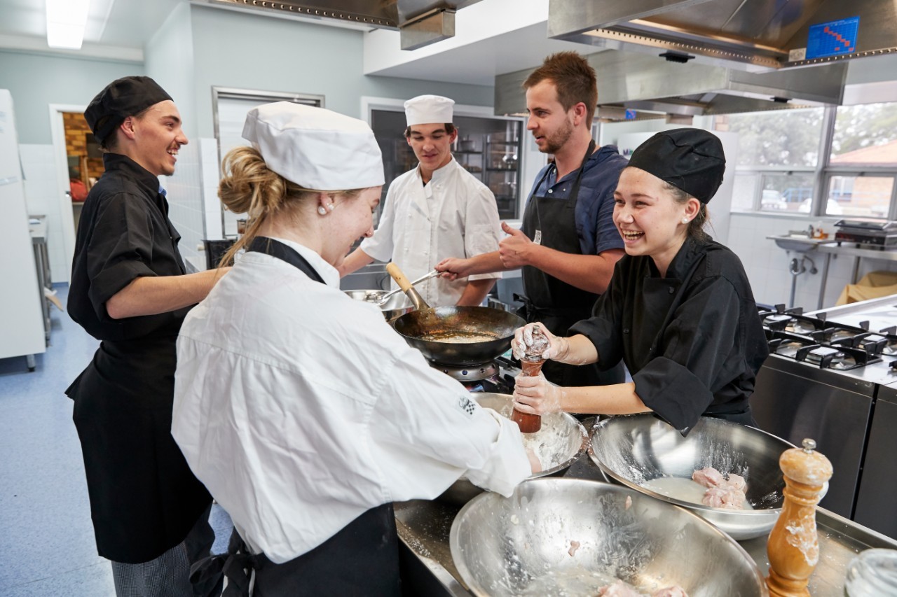 Students attend cooking hospitality course