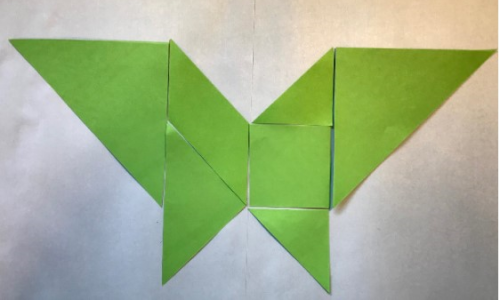 a butterfly made of tangram pieces