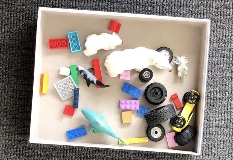 a box of object collections with different patterns