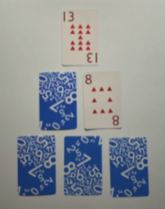 a triangle shape made of 6 cards with the top card number 13 and middle row card number 8