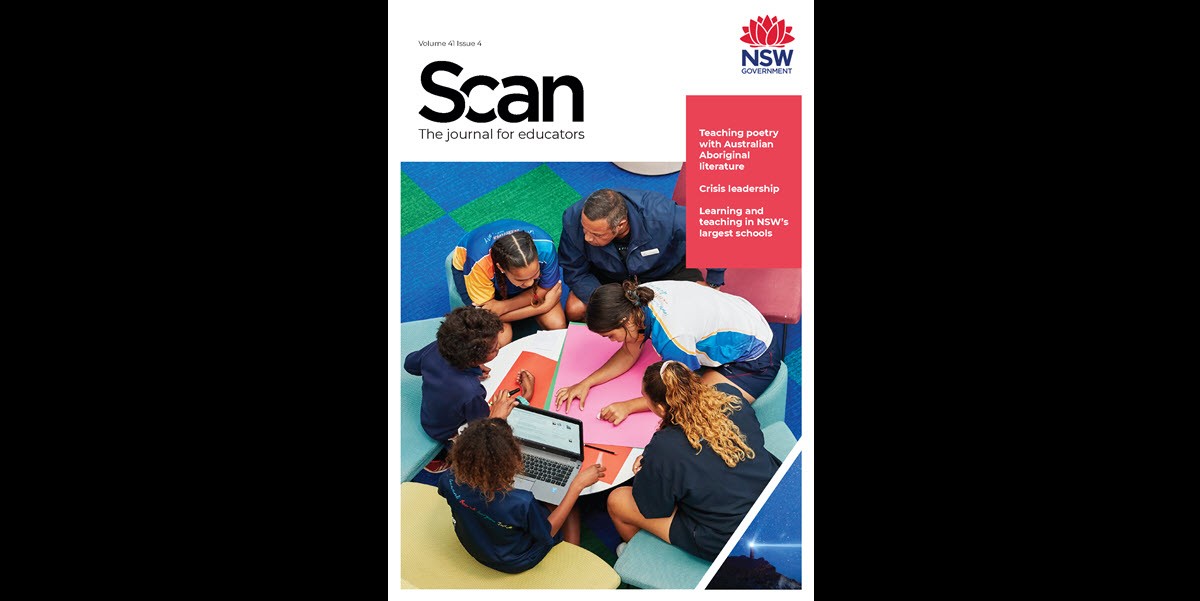 Cover of Scan journal showing a teacher and students collaborating around a desk, using a laptop and colourful cardboard.